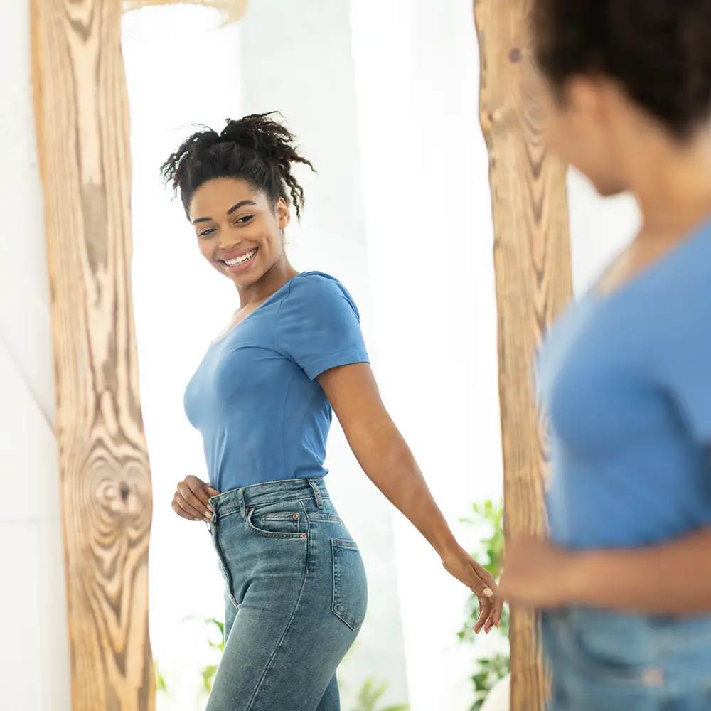 Woman looking at mirror